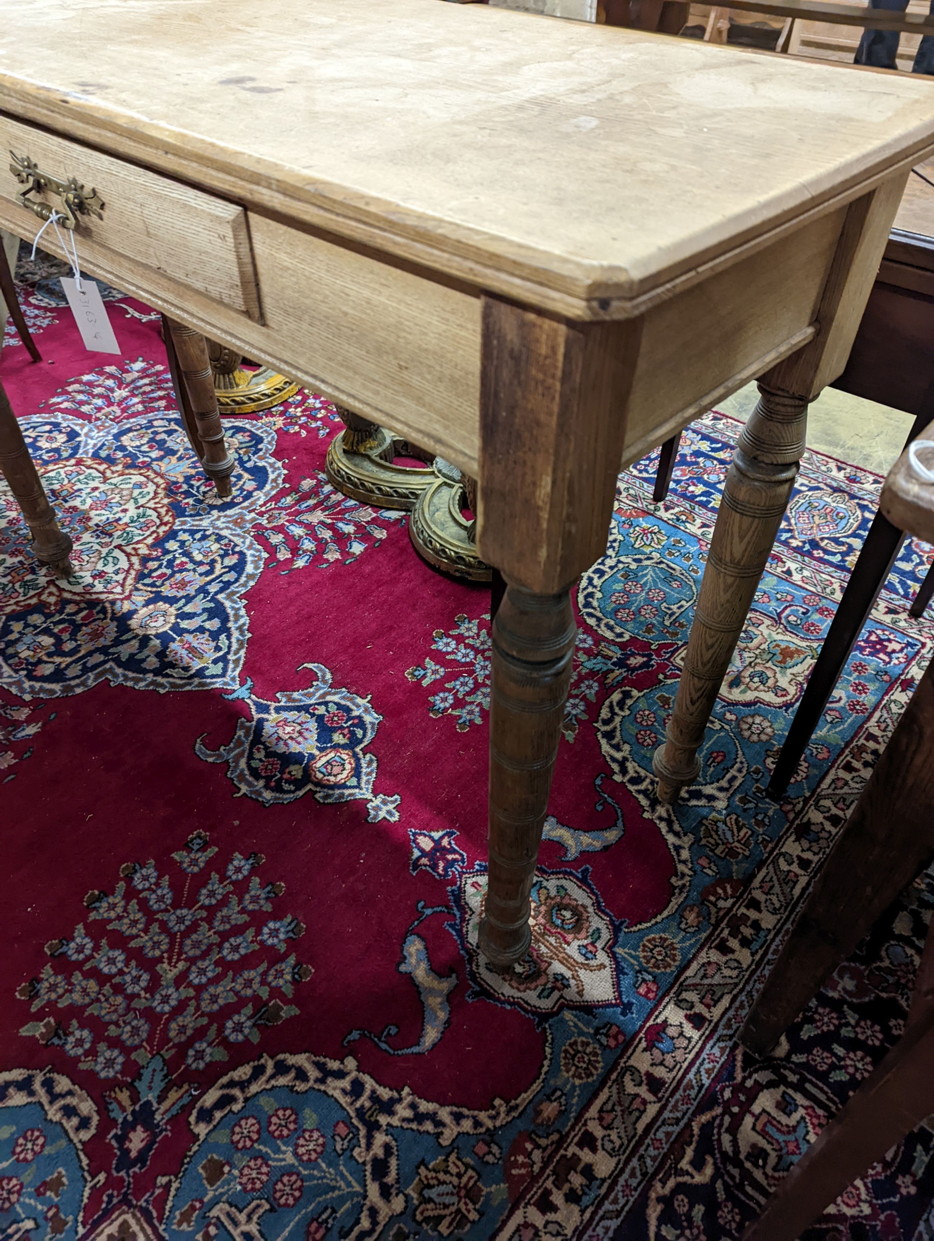 A Victorian ash hall table, Urquhart & Adamson cabinet makers Liverpool W-114cm, D-46cm, H-83cm.